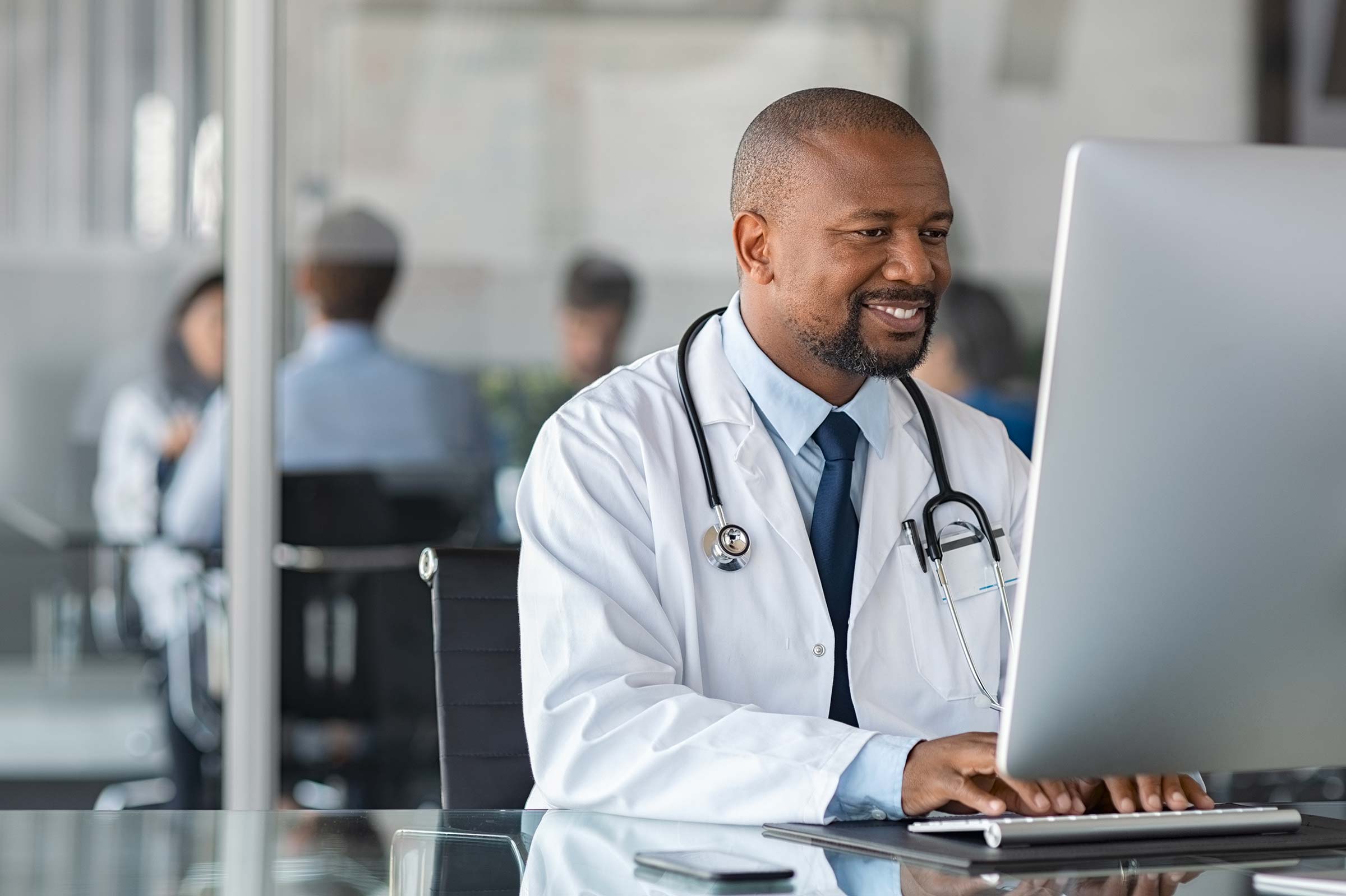 Doctor working on computer